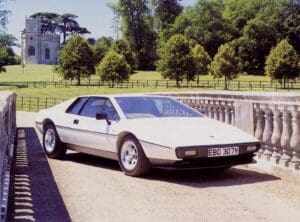 White Lotus Esprit parked on a bridge.